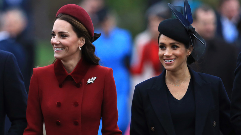 Kate Middleton and Meghan Markle smiling