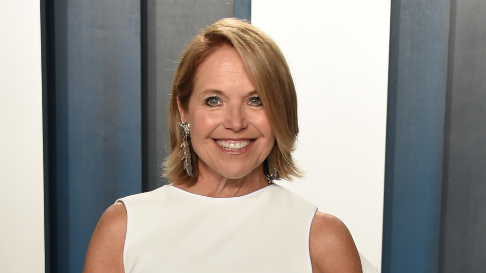 Katie Couric wearing a white tunic