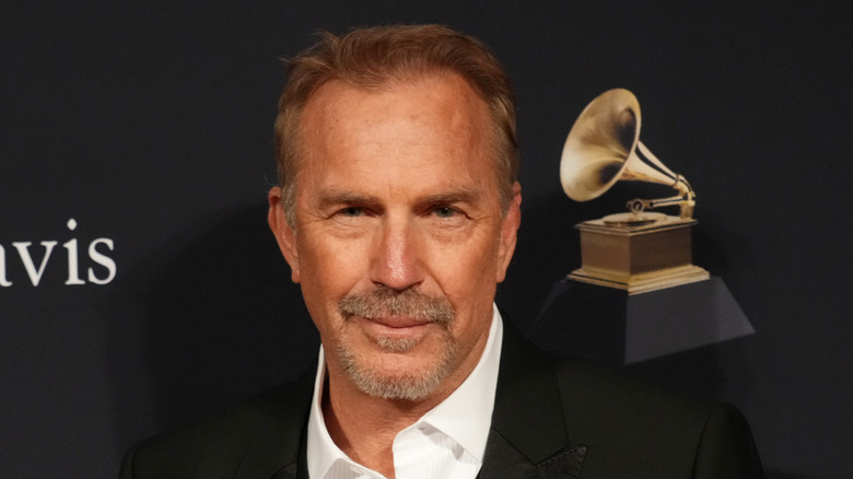 Kevin Costner poses for a photo.