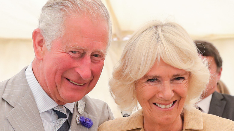 King Charles and Queen consort Camilla smiling