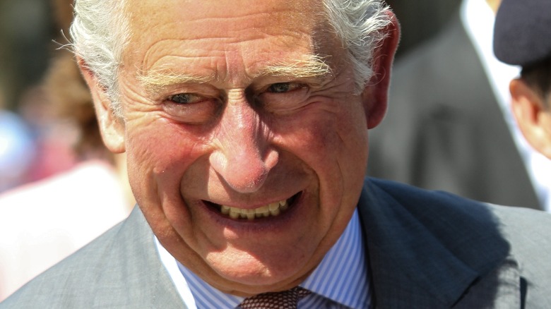 King Charles III smiling