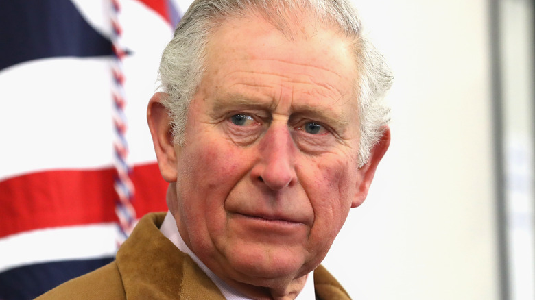 King Charles III with doubtful look