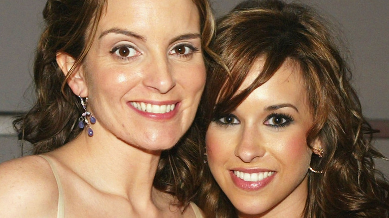 Lacey Chabert and Tina Fey smile