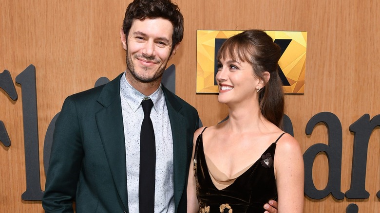 Leighton Meester and Adam Brody smiling