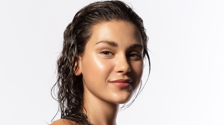 Woman with wet hair smiling
