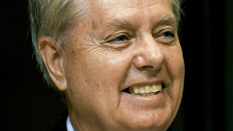 Lindsey Graham smiling during a Senate hearing