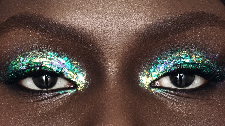 close up of eyes with glittery eye makeup 