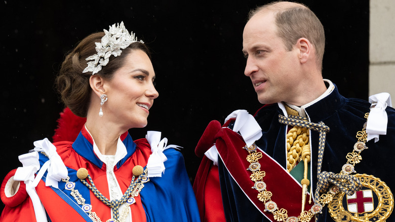 Catherine, Princess of Wales and William, Prince of Wales smiling at each other