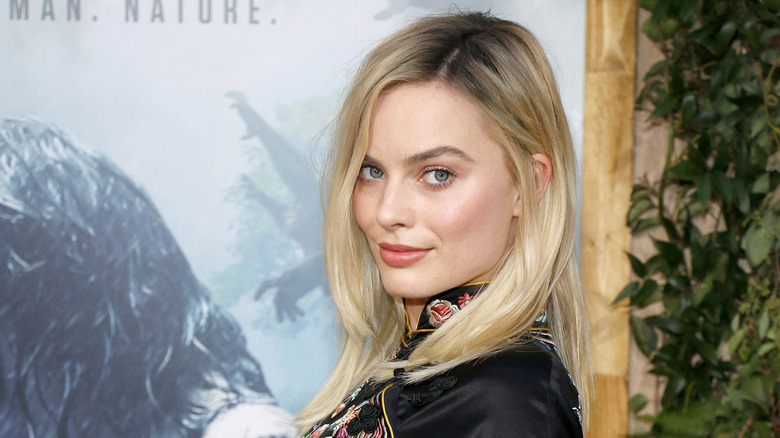 Harley Quinn looks over her shoulder