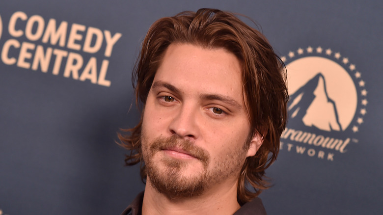 Luke Grimes at a red carpet event