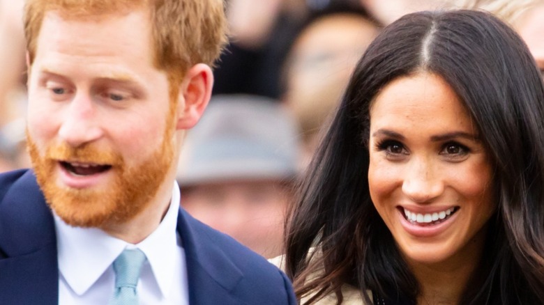 Prince Harry and Meghan Markle smiling