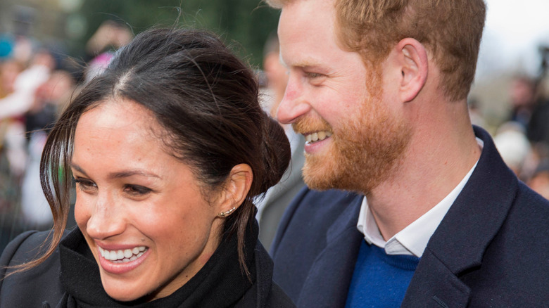 Meghan Markle and Prince Harry at outdoor event