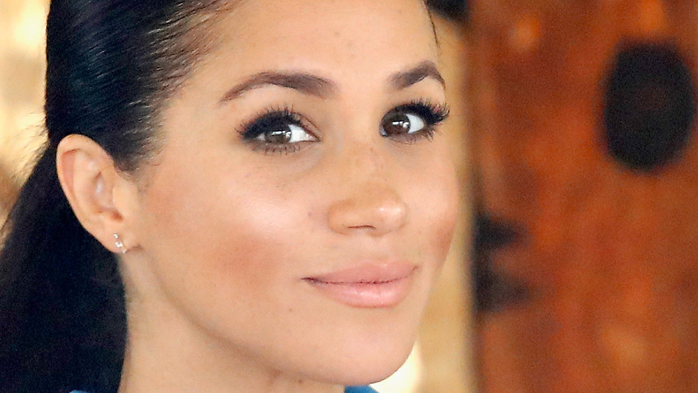 Meghan Markle poses during an appearance