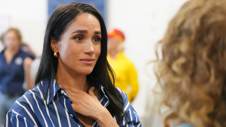 Meghan Markle looking emotional