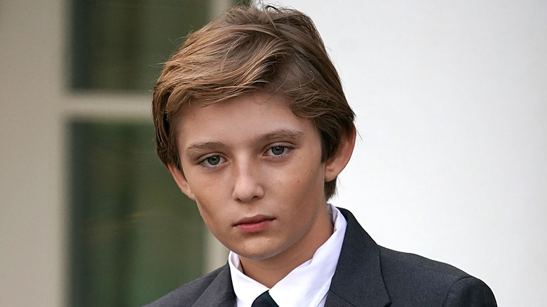 Barron Trump wearing suit