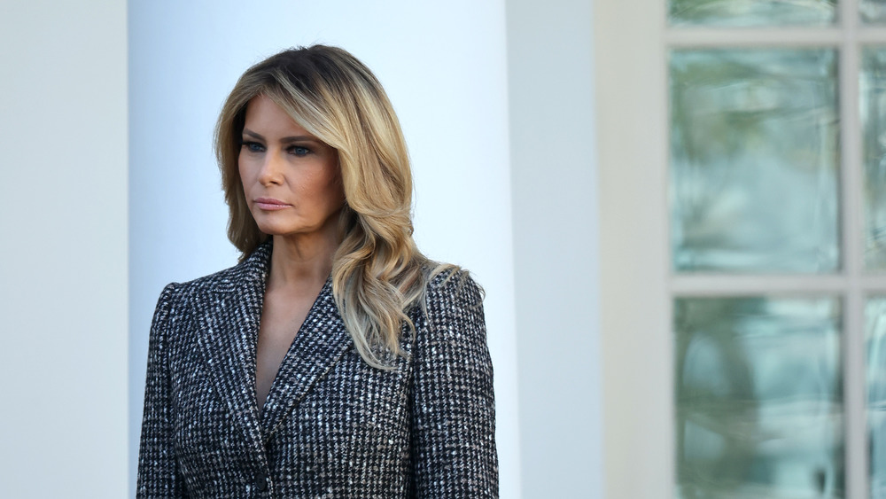 Melania Trump standing alone at the White House's turkey pardoning