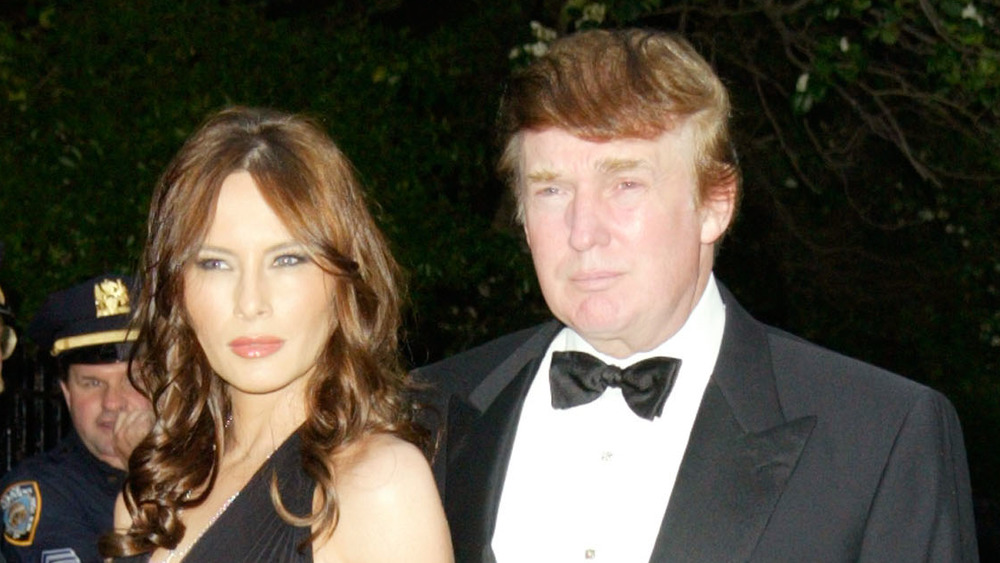 Donald and Melania Trump attending Rudy Giuliani's wedding in 2003
