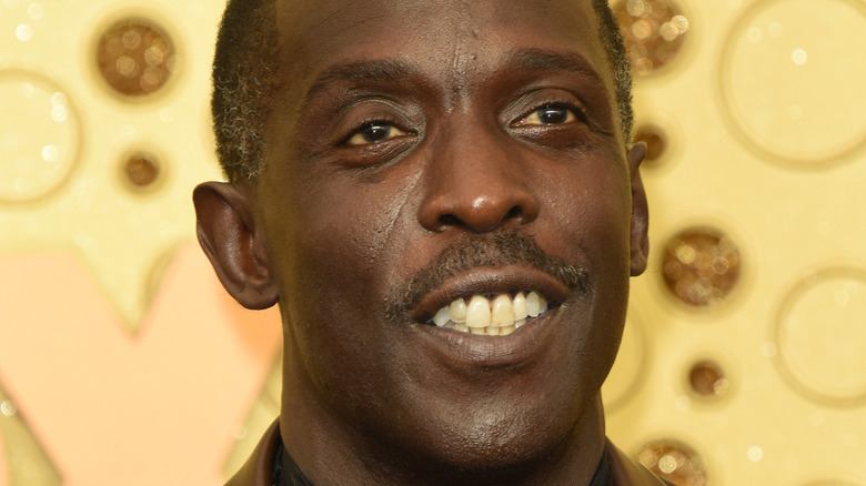 Michael K. Williams smiling at event