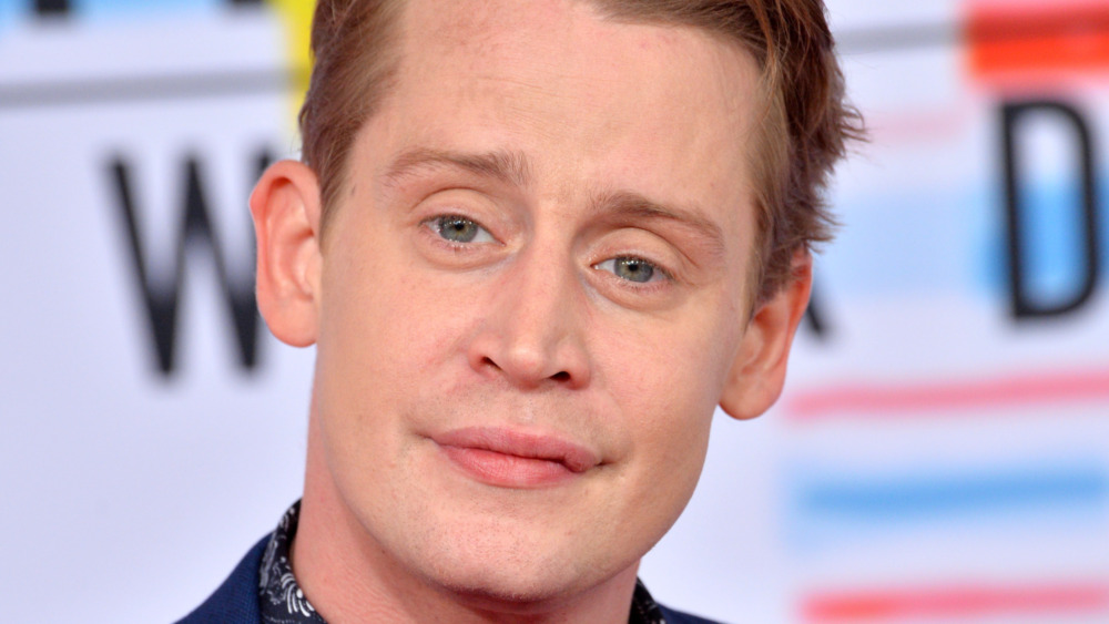 Macaulay Culkin smiling