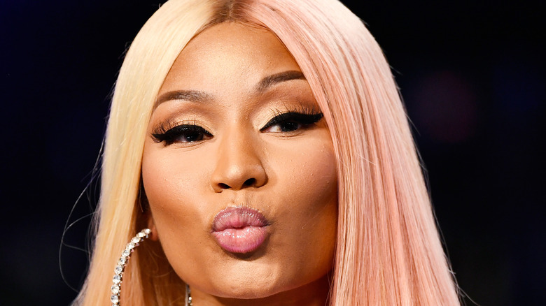 Nicki Minaj pursing her lips, red carpet