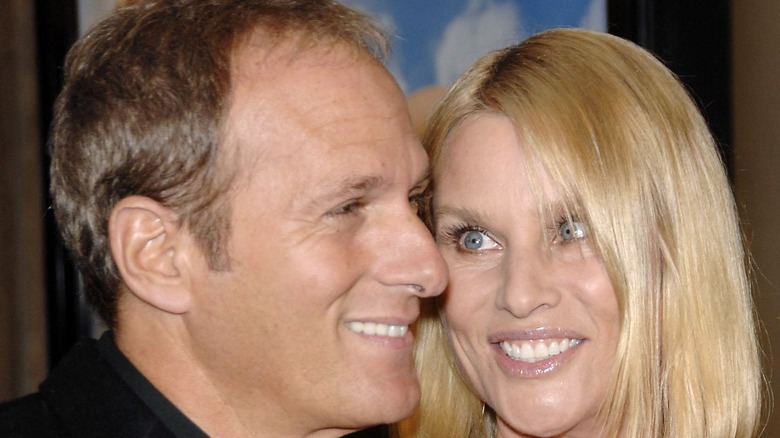 Nicollette Sheridan and Michael Bolton cuddle on red carpet