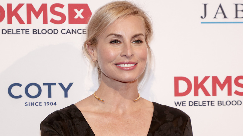 Niki Taylor smiling on the red carpet