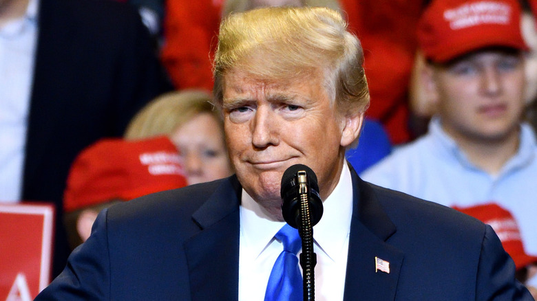 Trump smirking during a rally