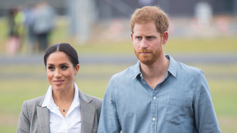 Prince Harry and Meghan Markle walking