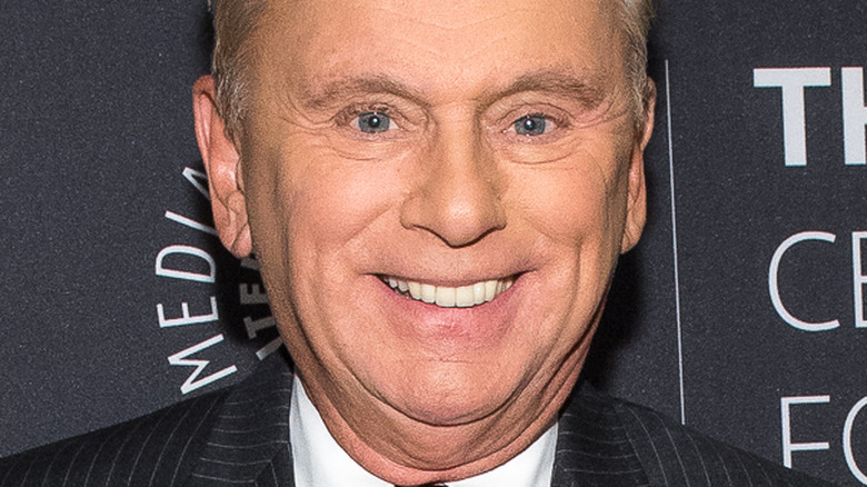 Pat Sajak smiling on the red carpet