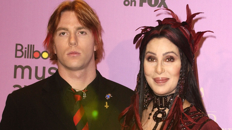 Cher and Elijah Blue Allman posing for photos