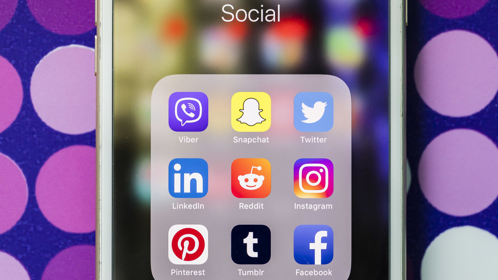 Social media app icons on phone
