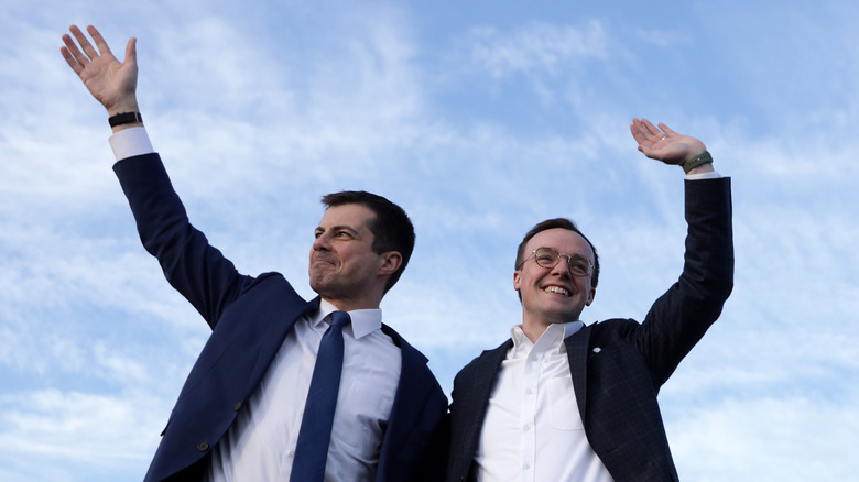 Chasten and Pete Buttigieg waving