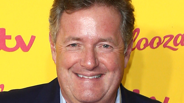 Piers Morgan yellow background