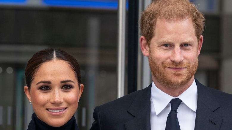 Prince Harry and Meghan Markle smiling