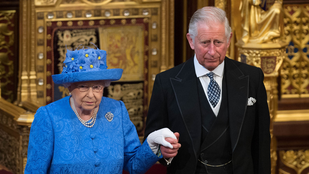 Queen Elizabeth and Prince Charles at event