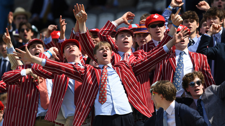 Eton College students cheering at cricket game