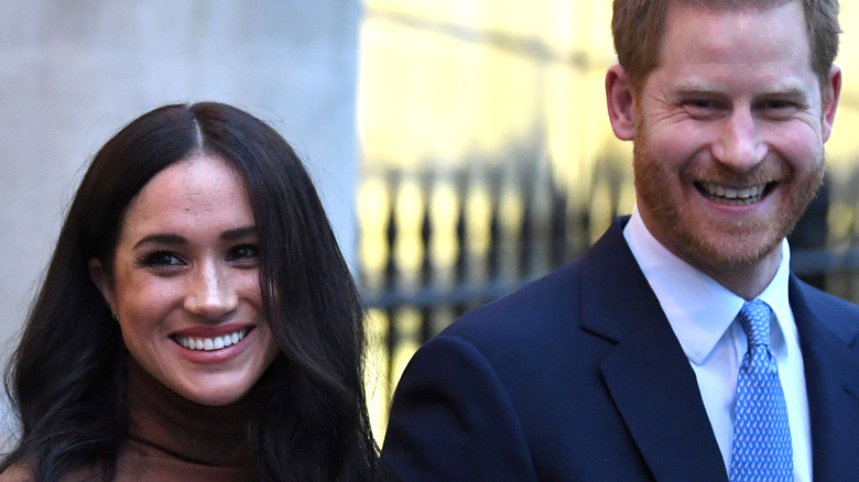 Meghan Markle and Prince Harry smiling