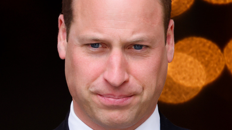 Prince William attends an event. 
