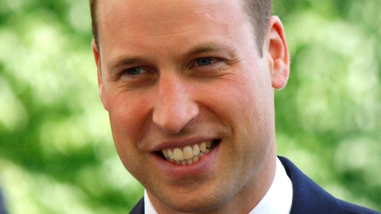 Prince William smiling outdoors