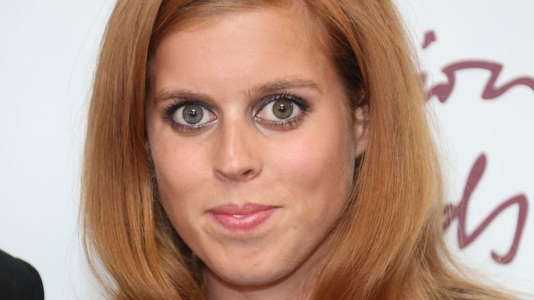 Princess Beatrice smiling at an event.