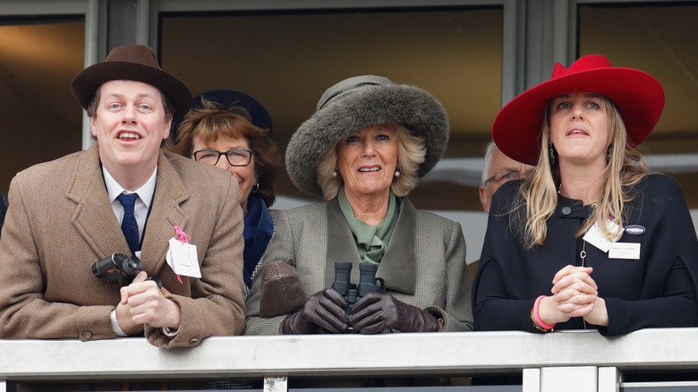 Queen Camilla watching an event her son Tom Parker Bowles and daughter Laura Lopes in 2015
