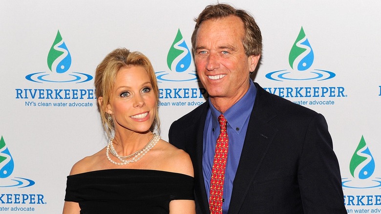 RFK Jr smiling alongside wife Cheryl Hines