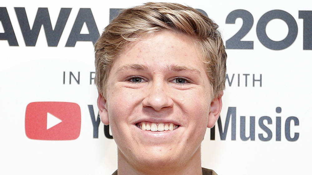 Robert Irwin smiles at an event