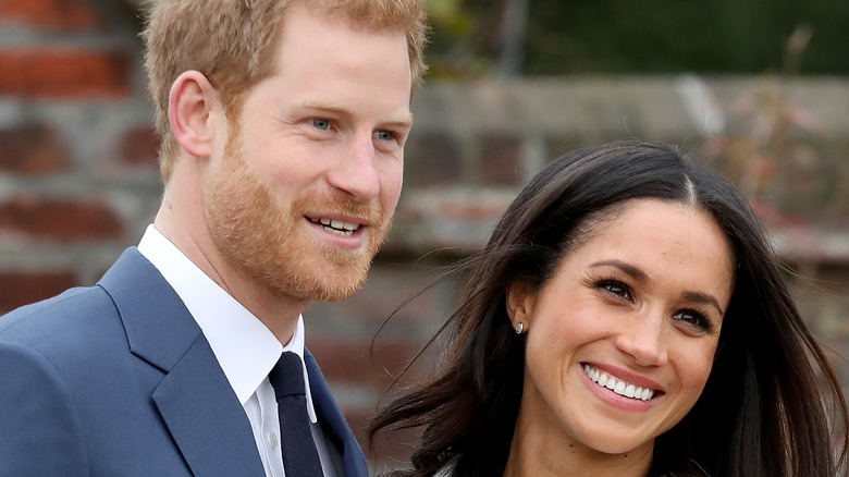 Meghan Markle and Prince Harry smiling 