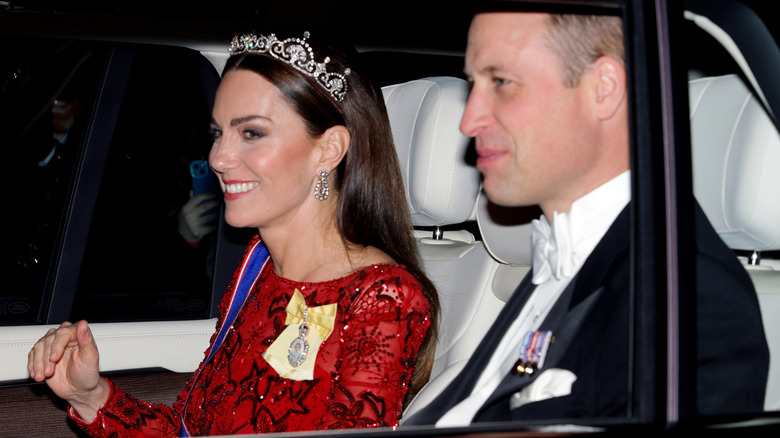 Kate Middleton and Prince William in the backseat of a car