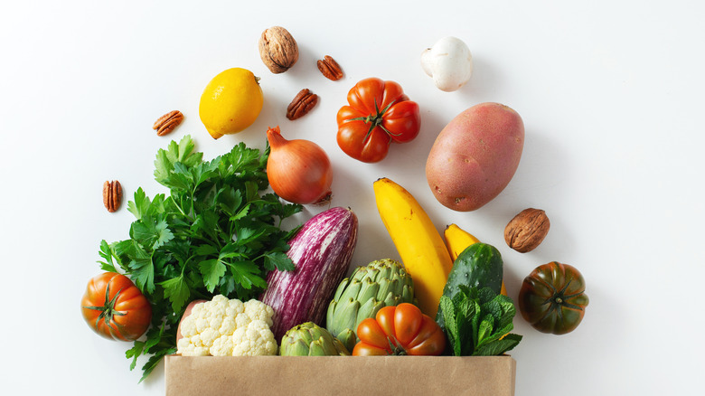 food spilling out of a grocery bag