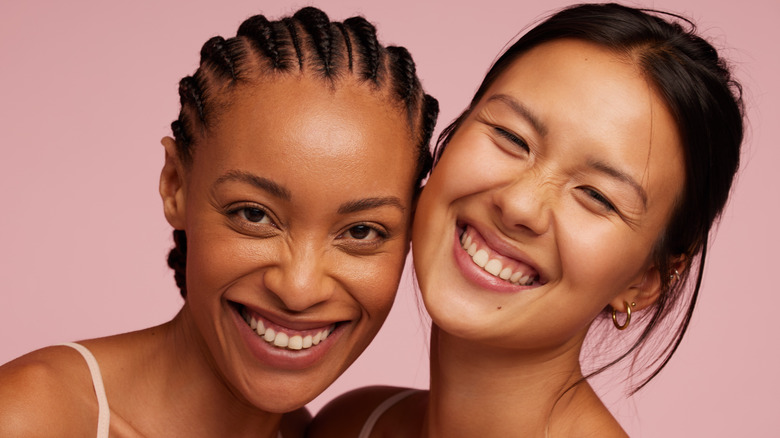 two women smiling 