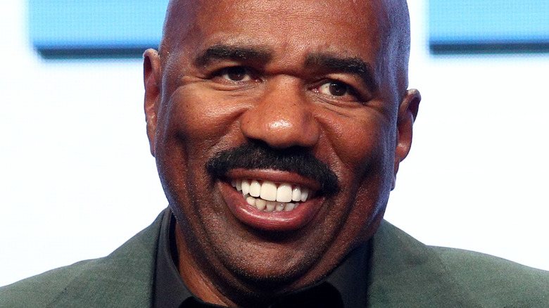 Steve Harvey smiling at an event