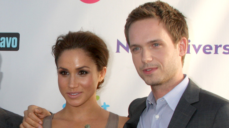 Meghan Markle and Patrick Adams at event