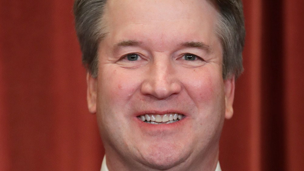 Brett Kavanagh smiling in official portrait